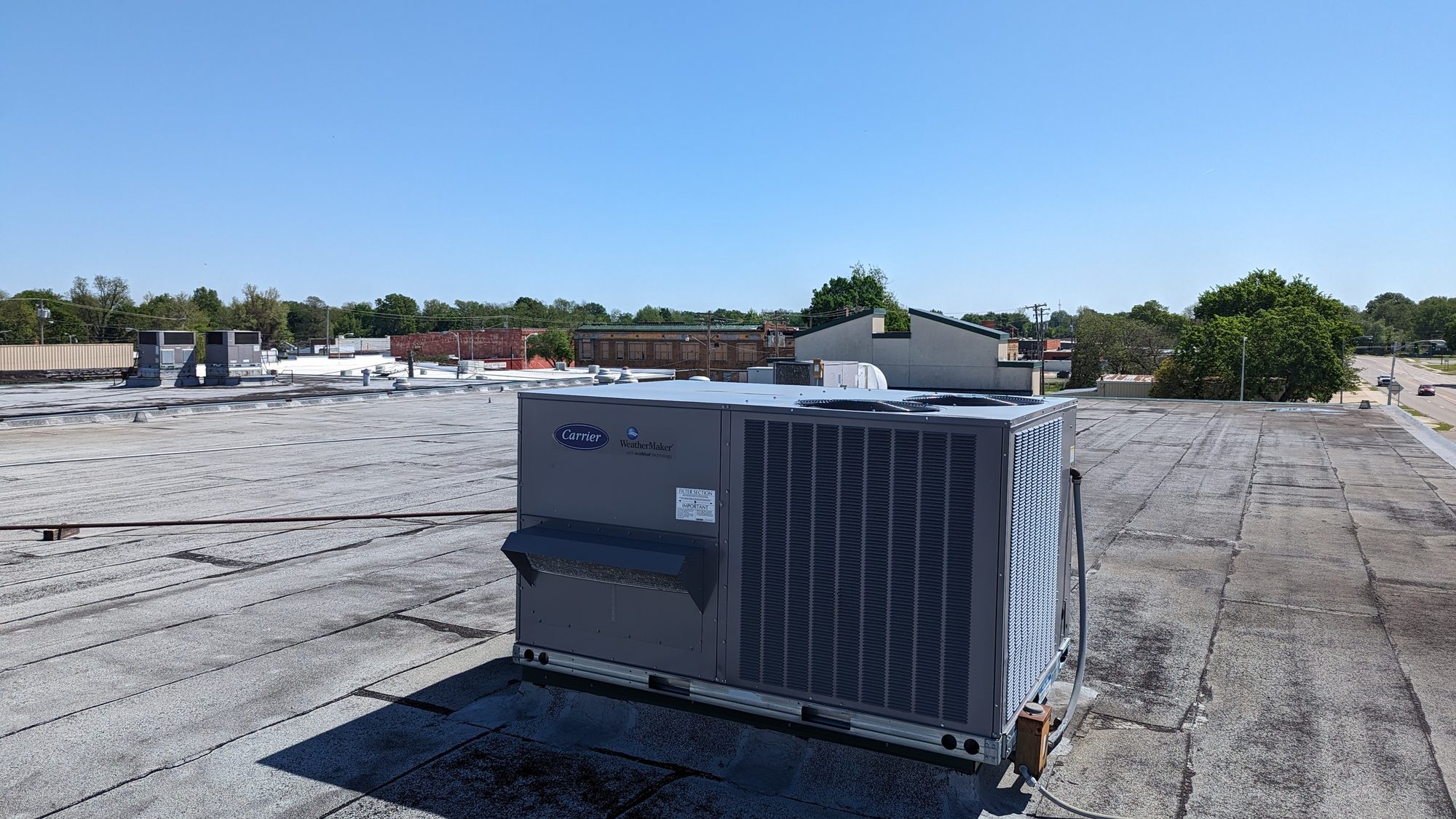 New Carrier WeatherMaker rooftop unit on a commercial building in downtown Jonesboro